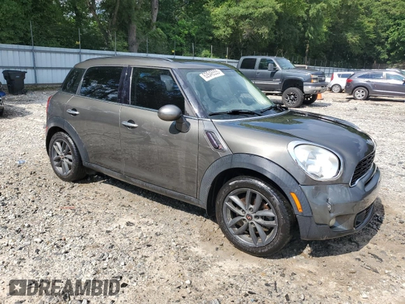 2014 MINI Countryman S with VIN WMWZC3C57EWP25099, listed as a Copart auction lot 62646555 with 153,059 mi miles and Salvage title. Bid and sale history available at DreamBid. Image 4.