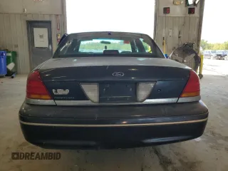 1999 Ford Crown Victoria Police with VIN 2FAFP71WXXX192272, listed as a Copart auction lot 73577384 with 278,535 mi miles and Salvage Title. Bid and sale history available at carsss.com. Image 6.