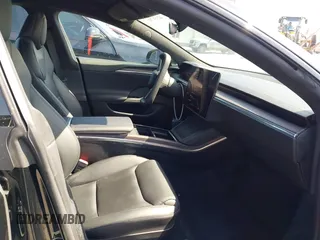 2022 Tesla Model S with VIN 5YJSA1E5XNF467435, listed as a IAAI auction lot 42538706 with 26,504 mi miles and . Bid and sale history available at DreamBid. Image 5.