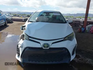 2017 Toyota Corolla L with VIN 2T1BURHE8HC814965, listed as a IAAI auction lot 42387645 with 230,303 mi miles and . Bid and sale history available at DreamBid. Image 12.