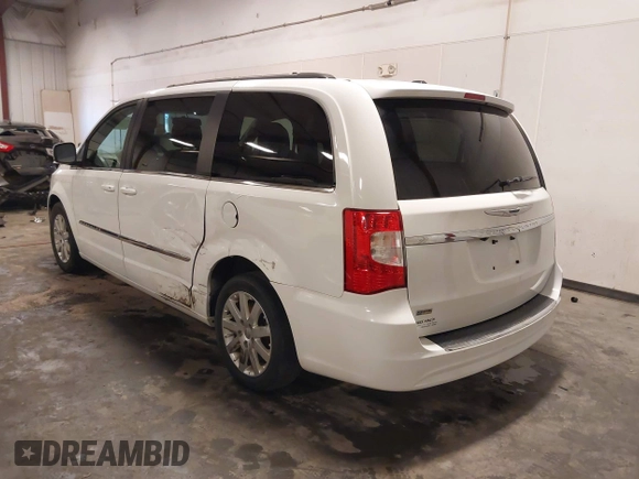 2015 Chrysler Town & Country Touring with VIN 2C4RC1BG9FR626482, listed as a IAAI auction lot 41879865 with 129,694 mi miles and . Bid and sale history available at DreamBid. Image 3.