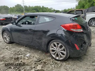 2012 Hyundai Veloster w/Black Int with VIN KMHTC6AD5CU065525, listed as a Copart auction lot 56415785 with 100,151 mi miles and Salvage title. Bid and sale history available at DreamBid. Image 2.