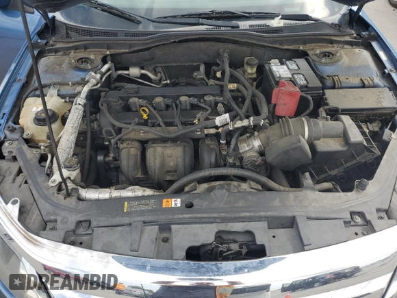 2010 Ford Fusion SE z VIN 3FAHP0HA2AR208559, wystawiony jako Copart lot #64288565 z przebiegiem 186 231 mil mil oraz Czysty tytuł • Clean title. Historia ofert i sprzedaży dostępna na DreamBid. Obrazek 11.
