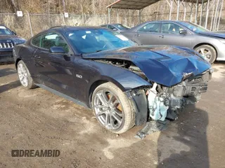 2021 Ford Mustang GT with VIN 1FA6P8CF0M5133019, listed as a IAAI auction lot 41534938 with 65,526 mi miles. Bid and sale history available at carsss.com. Image 1.
