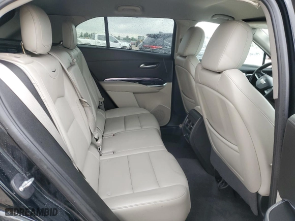 2023 Cadillac XT4 FWD Luxury with VIN 1GYAZAR45PF218684, listed as a Copart auction lot 54427565 with 74,920 mi miles and Salvage Title. Bid and sale history available at carsss.com. Image 11.