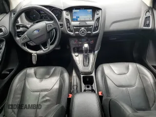 2017 Ford Focus Titanium z VIN 1FADP3N22HL307260, wystawiony jako Copart lot #61399785 z przebiegiem 103 293 mil mil oraz Szkoda całkowita • Salvage title. Historia ofert i sprzedaży dostępna na DreamBid. Obrazek 8.