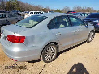 2011 Volkswagen Jetta SEL with VIN 3VWLX7AJ6BM330148, listed as a IAAI auction lot 41663551 with 128,673 mi miles and . Bid and sale history available at DreamBid. Image 4.