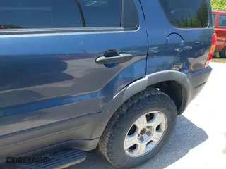 2001 Ford Escape XLT with VIN 1FMCU041X1KF10409, listed as a IAAI auction lot 39780383 with 246,336 mi miles. Bid and sale history available at carsss.com. Image 6.