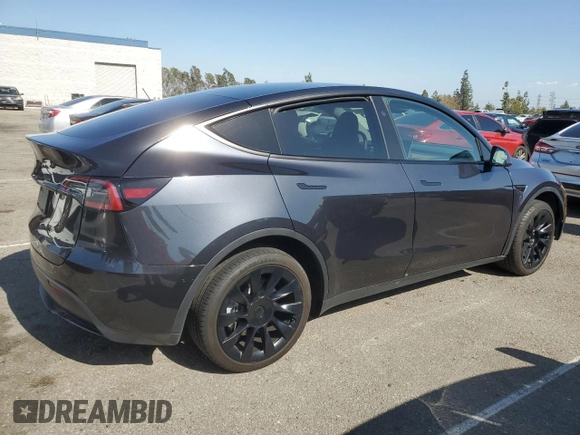 2024 Tesla Model Y with VIN 7SAYGDED7RF056973, listed as a Copart auction lot 55310705 with 15,391 mi miles and Salvage Title. Bid and sale history available at DreamBid. Image 3.