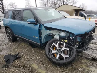 2024 Rivian R1S Adventure z VIN 7PDSGABA1RN031444, wystawiony jako Copart lot #43312765 z przebiegiem Nie podano mil oraz Szkody całkowita. Historia ofert i sprzedaży dostępna na DreamBid. Obrazek 4.