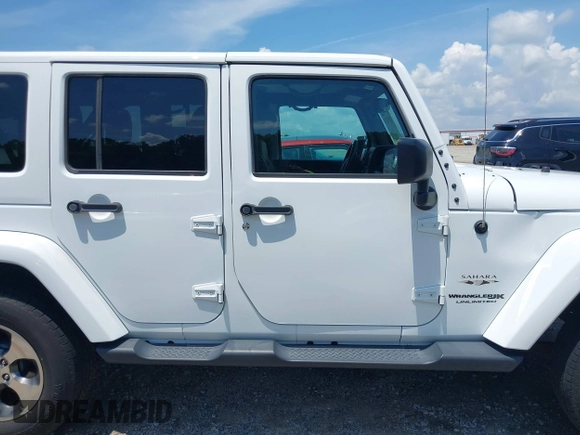 2018 Jeep Wrangler Unlimited Sahara with VIN 1C4BJWEG3JL805263, listed as a IAAI auction lot 42593276 with 96,489 mi miles and . Bid and sale history available at DreamBid. Image 13.