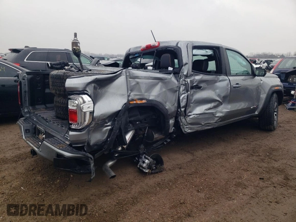 2024 GMC Canyon 4WD AT4 z VIN 1GTP6DEK8R1306627, wystawiony jako Copart lot #80921614 z przebiegiem 6 mil mil oraz Szkoda całkowita • Salvage title. Historia ofert i sprzedaży dostępna na DreamBid. Obrazek 3.