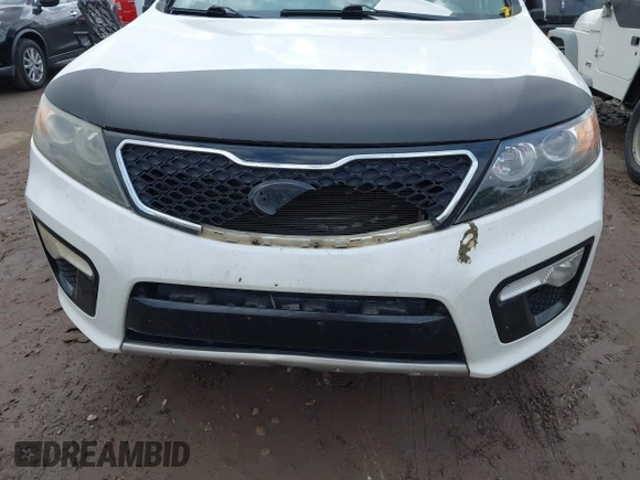 2012 Kia Sorento SX z VIN 5XYKWDA23CG231228, wystawiony jako IAAI lot #42366536 z przebiegiem 154 627 mil mil oraz . Historia ofert i sprzedaży dostępna na DreamBid. Obrazek 6.