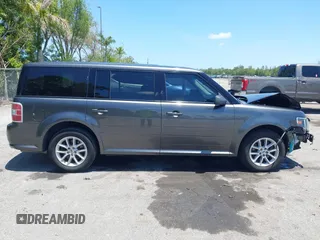 2018 Ford Flex SE z VIN 2FMGK5B89JBA18548, wystawiony jako IAAI lot #42211678 z przebiegiem 87 327 mil mil oraz . Historia ofert i sprzedaży dostępna na DreamBid. Obrazek 14.