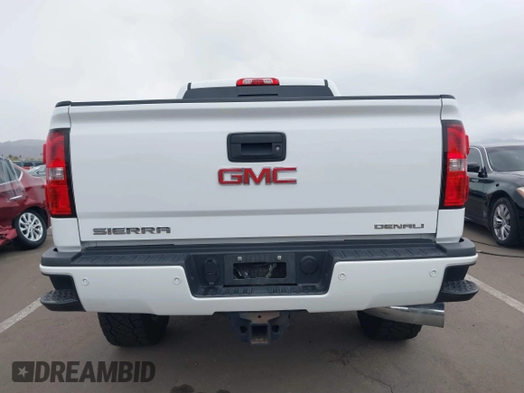 2016 GMC Sierra 2500HD Denali z VIN 1GT12UE89GF172877, wystawiony jako IAAI lot #41807741 z przebiegiem 36 719 mil mil oraz . Historia ofert i sprzedaży dostępna na DreamBid. Obrazek 16.