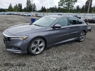 2018 Honda Accord Touring z VIN 1HGCV1F98JA106459, wystawiony jako Copart lot #57135675 z przebiegiem 99 634 mil mil oraz Szkoda całkowita • Salvage title. Historia ofert i sprzedaży dostępna na DreamBid. Obrazek 1.