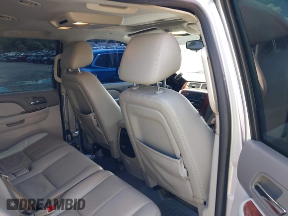 2012 Chevrolet Suburban LT z VIN 1GNSCJE01CR143982, wystawiony jako IAAI lot #42257552 z przebiegiem 202 973 mil mil oraz . Historia ofert i sprzedaży dostępna na DreamBid. Obrazek 8.