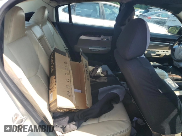 2009 Chrysler Sebring Limited with VIN 1C3LC56V39N566582, listed as a Copart auction lot 70522454 with 148,113 mi miles and Salvage title. Bid and sale history available at DreamBid. Image 10.