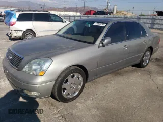 2003 Lexus LS 430 with VIN JTHBN30FX30095329, listed as a Copart auction lot 73690244 with 184,418 mi miles and Salvage Title. Bid and sale history available at DreamBid. Image 1.