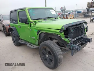 2020 Jeep Wrangler Sport S with VIN 1C4GJXAG1LW103235, listed as a IAAI auction lot 42126250 with 64,986 mi miles and . Bid and sale history available at DreamBid. Image 1.
