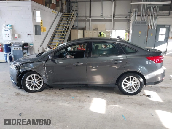 2017 Ford Focus SE with VIN 1FADP3F29HL220440, listed as a IAAI auction lot 41975013 with 40,295 mi miles and . Bid and sale history available at DreamBid. Image 14.