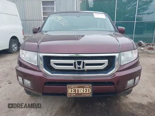 2011 Honda Ridgeline RTL with VIN 5FPYK1F51BB007959, listed as a IAAI auction lot 41894350 with 186,926 mi miles. Bid and sale history available at carsss.com. Image 12.