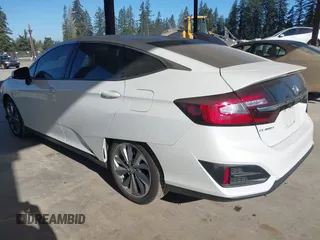 2018 Honda Clarity Plug-In Hybrid Touring with VIN JHMZC5F38JC003207, listed as a IAAI auction lot 42057987 with 35,420 mi miles. Bid and sale history available at carsss.com. Image 3.
