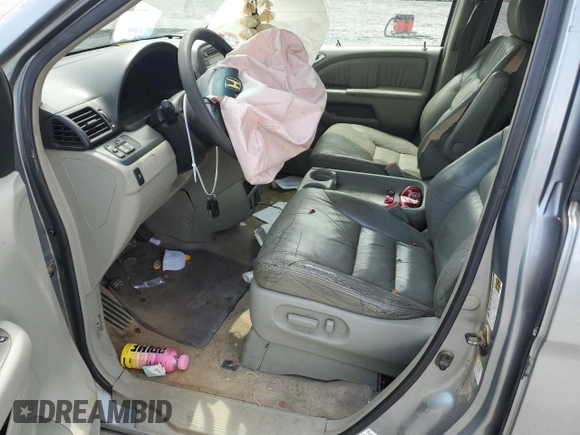 2005 Honda Odyssey EX-L with VIN 5FNRL38765B088756, listed as a Copart auction lot 57071365 with 243,277 mi miles and Salvage title. Bid and sale history available at DreamBid. Image 7.