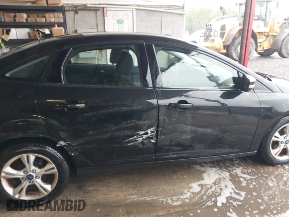 2013 Ford Focus SE with VIN 1FADP3F21DL333194, listed as a IAAI auction lot 42071641 with 107,912 mi miles. Bid and sale history available at carsss.com. Image 13.