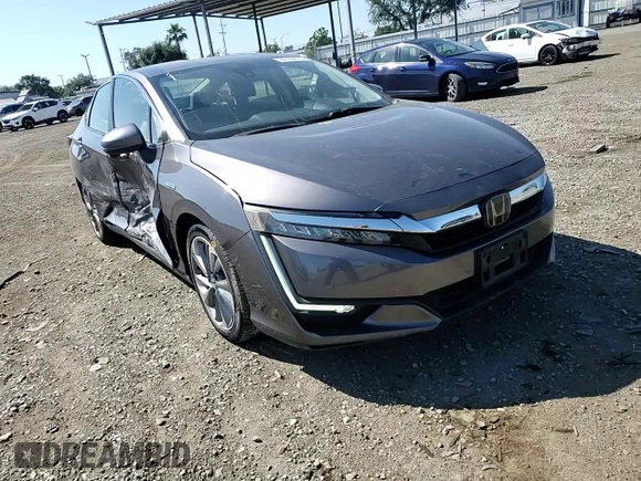 2018 Honda Clarity Touring z VIN JHMZC5F36JC014495, wystawiony jako Copart lot #56139675 z przebiegiem 75 020 mil mil oraz Szkoda całkowita • Salvage title. Historia ofert i sprzedaży dostępna na DreamBid. Obrazek 13.