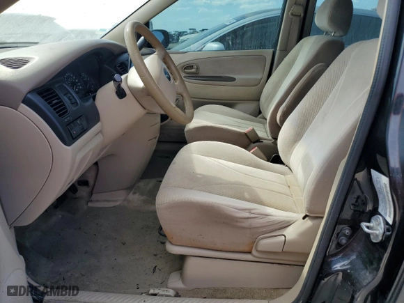2001 Mazda MPV DX with VIN JM3LW28G310173674, listed as a Copart auction lot 75312034 with 0 mi miles and Salvage Title. Bid and sale history available at carsss.com. Image 7.