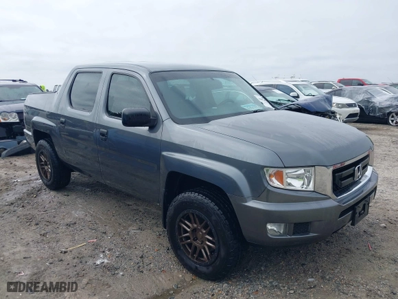2010 Honda Ridgeline RT with VIN 5FPYK1F28AB010815, listed as a IAAI auction lot 40405105 with 275,762 mi miles. Bid and sale history available at carsss.com. Image 1.