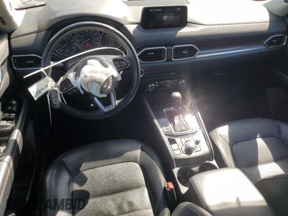 2017 Mazda CX-5 Grand Touring with VIN JM3KFBDL7H0202831, listed as a Copart auction lot 54943115 with 69,933 mi miles and Salvage Title. Bid and sale history available at carsss.com. Image 8.