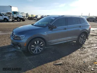 2020 Volkswagen Tiguan SEL Premium R-Line with VIN 3VV4B7AXXLM068664, listed as a Copart auction lot 83243264 with 132,734 mi miles and Salvage Title. Bid and sale history available at carsss.com. Image 1.