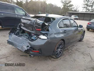 2019 BMW 3 Series 330i xDrive with VIN WBA5R7C53KAJ84615, listed as a IAAI auction lot 41774006 with Not provided miles and . Bid and sale history available at DreamBid. Image 4.