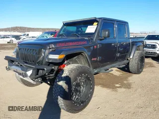 2020 Jeep Gladiator Rubicon with VIN 1C6JJTBG5LL179188, listed as a IAAI auction lot 41316367 with 136,670 mi miles and . Bid and sale history available at DreamBid. Image 17.