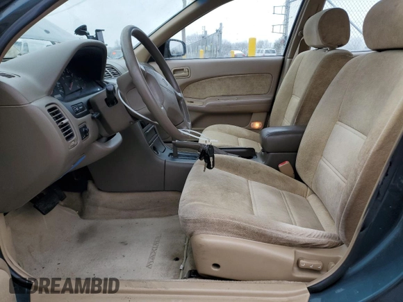 1998 Nissan Maxima GXE with VIN JN1CA21D1WT607137, listed as a Copart auction lot 43629285 with 159,196 mi miles and Salvage title. Bid and sale history available at DreamBid. Image 7.