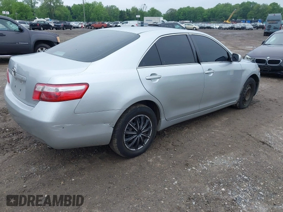 2007 Toyota Camry CE with VIN 4T1BE46K77U101223, listed as a IAAI auction lot 42282044 with 153,807 mi miles and . Bid and sale history available at DreamBid. Image 4.