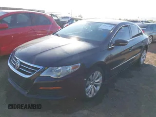 2012 Volkswagen CC Sport PZEV with VIN WVWMP7AN6CE545188, listed as a IAAI auction lot 42022015 with 122,184 mi miles. Bid and sale history available at carsss.com. Image 2.