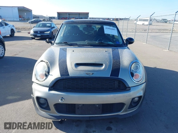 2007 MINI Hardtop S with VIN WMWMF73567TL91385, listed as a IAAI auction lot 41866865 with 114,778 mi miles and . Bid and sale history available at DreamBid. Image 12.
