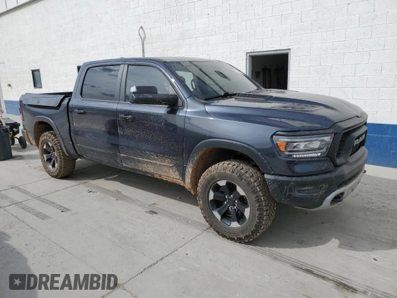 2020 Ram 1500 Rebel with VIN 1C6SRFLTXLN118580, listed as a Copart auction lot 54585955 with 39,028 mi miles and Salvage title. Bid and sale history available at DreamBid. Image 4.