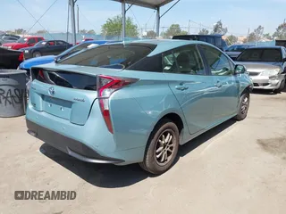 2017 Toyota Prius Two with VIN JTDKARFU9H3042326, listed as a IAAI auction lot 41991608 with 90,089 mi miles. Bid and sale history available at carsss.com. Image 4.