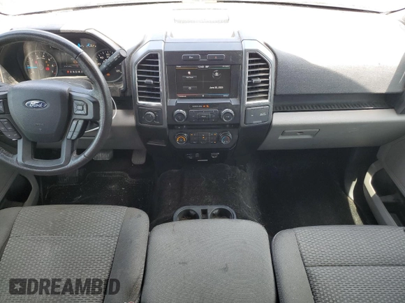 2015 Ford F-150 XL with VIN 1FTEW1CF3FFA48558, listed as a Copart auction lot 62067385 with 151,014 mi miles and Salvage title. Bid and sale history available at DreamBid. Image 8.