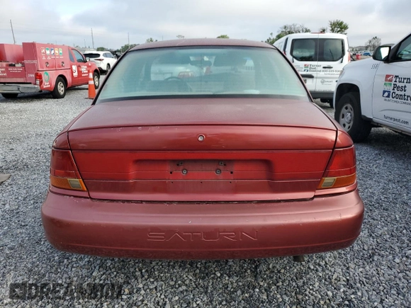 1998 Saturn SL z VIN 1G8ZK5271WZ179625, wystawiony jako Copart lot #50878255 z przebiegiem 180 085 mil mil oraz Szkoda całkowita • Salvage title. Historia ofert i sprzedaży dostępna na DreamBid. Obrazek 6.