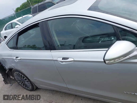 2017 Ford Fusion Hybrid Titanium с VIN 3FA6P0RU5HR181755, выставлен на аукционе IAAI как лот 42704832 с пробегом 152 688 миль миль и . История ставок и продаж доступна на DreamBid. Изображение 13.