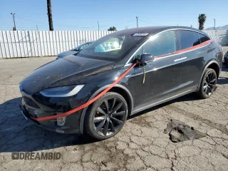 2018 Tesla Model X 75D with VIN 5YJXCAE24JF142506, listed as a Copart auction lot 43536215 with Not Provided miles and Salvage Title. Bid and sale history available at carsss.com. Image 1.