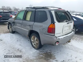 2007 GMC Envoy SLE with VIN 1GKDT13S072246688, listed as a IAAI auction lot 41258265 with 218,001 mi miles. Bid and sale history available at carsss.com. Image 3.