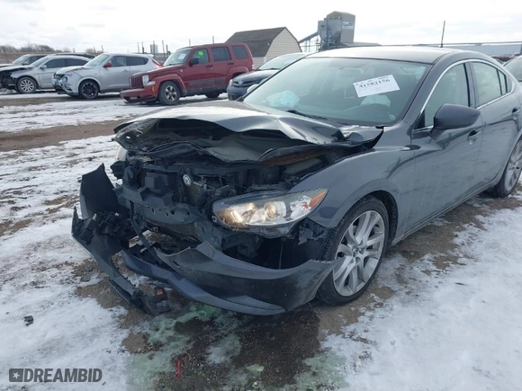 2016 Mazda Mazda6 i Touring with VIN JM1GJ1V50G1482656, listed as a IAAI auction lot 41582156 with 99,756 mi miles. Bid and sale history available at carsss.com. Image 6.
