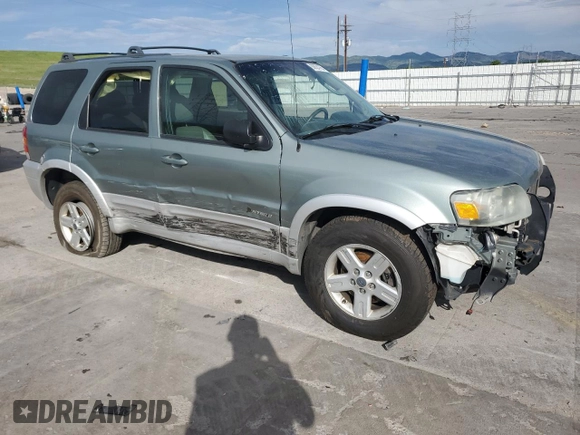 2005 Ford Escape Hybrid z VIN 1FMCU95HX5KE24619, wystawiony jako Copart lot #60624765 z przebiegiem 209 937 mil mil oraz Nie do naprawy • Non repairable. Historia ofert i sprzedaży dostępna na DreamBid. Obrazek 4.