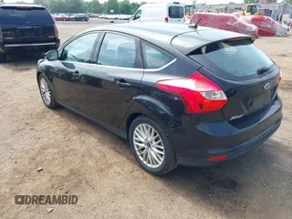 2014 Ford Focus Titanium with VIN 1FADP3N2XEL319782, listed as a IAAI auction lot 42615481 with 132,423 mi miles and . Bid and sale history available at DreamBid. Image 3.